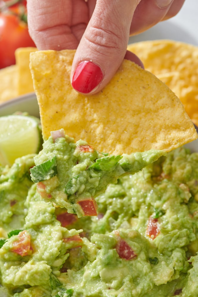 close up of guacamole dip on chip