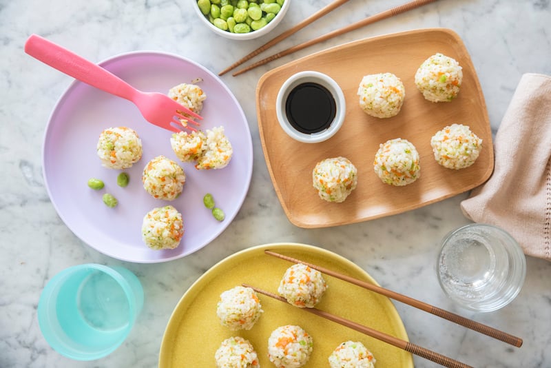 Japanese Rice Balls on small plates.