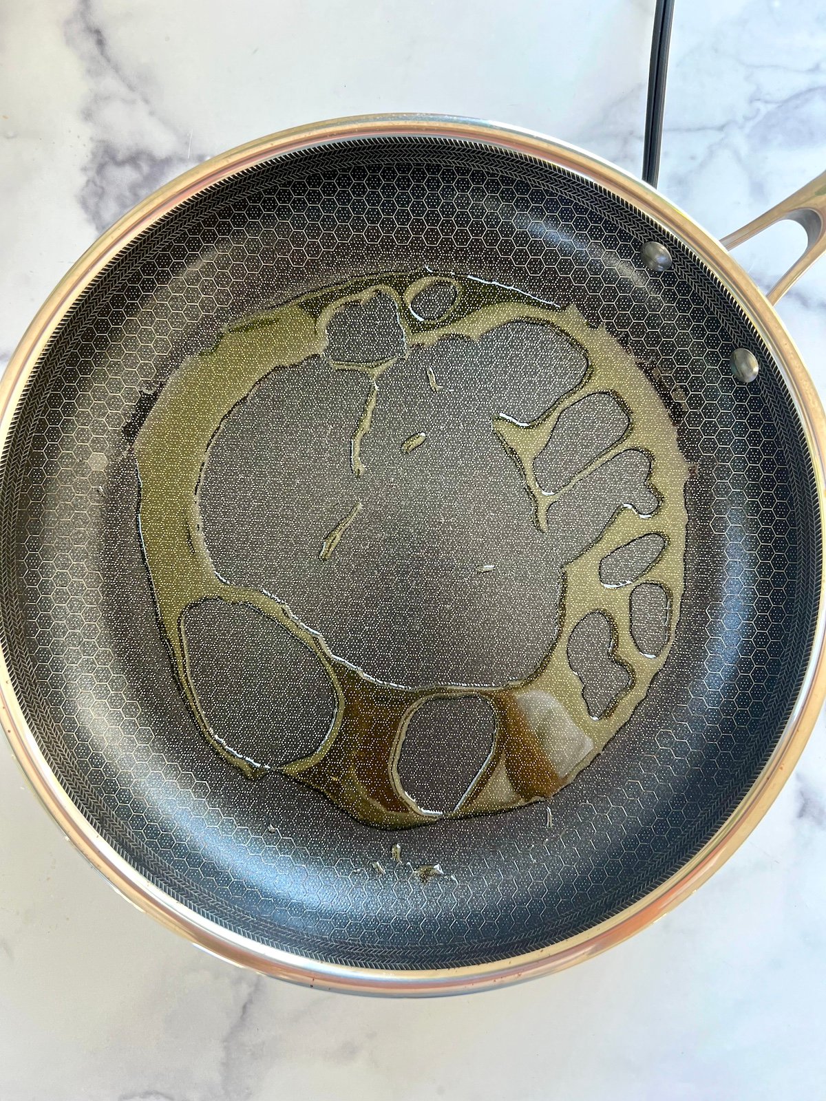 Oil heating in sauté pan.