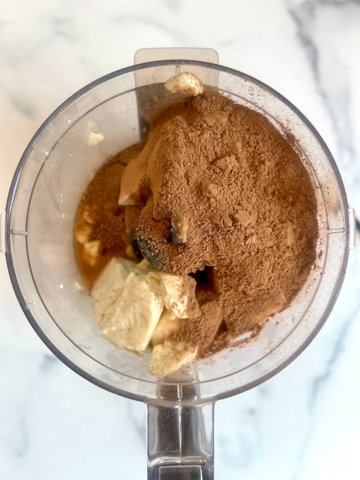 Chocolate Tofu Pudding ingredients in a food processor bowl.