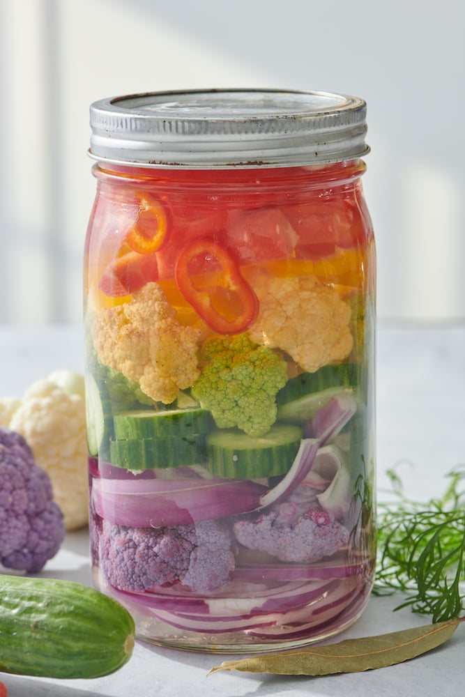 vegetables layered by color in mason jar