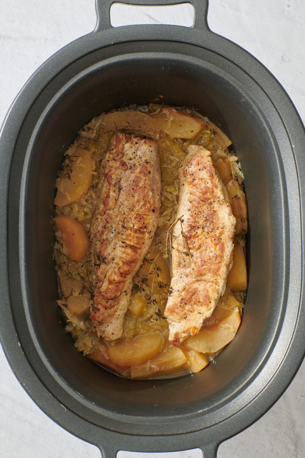 Slow Cooker Pork Tenderloin with Apples and Sauerkraut - Weelicious