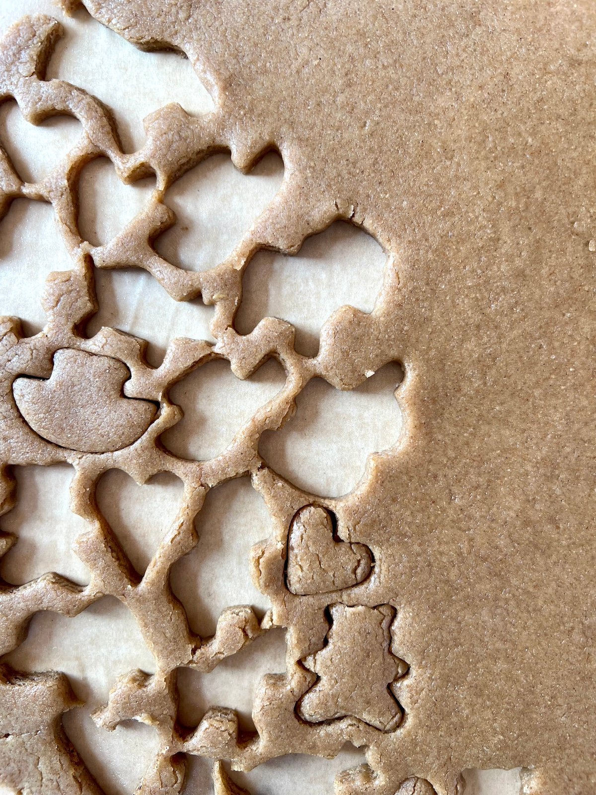 Graham cracker dough with shapes cut out.