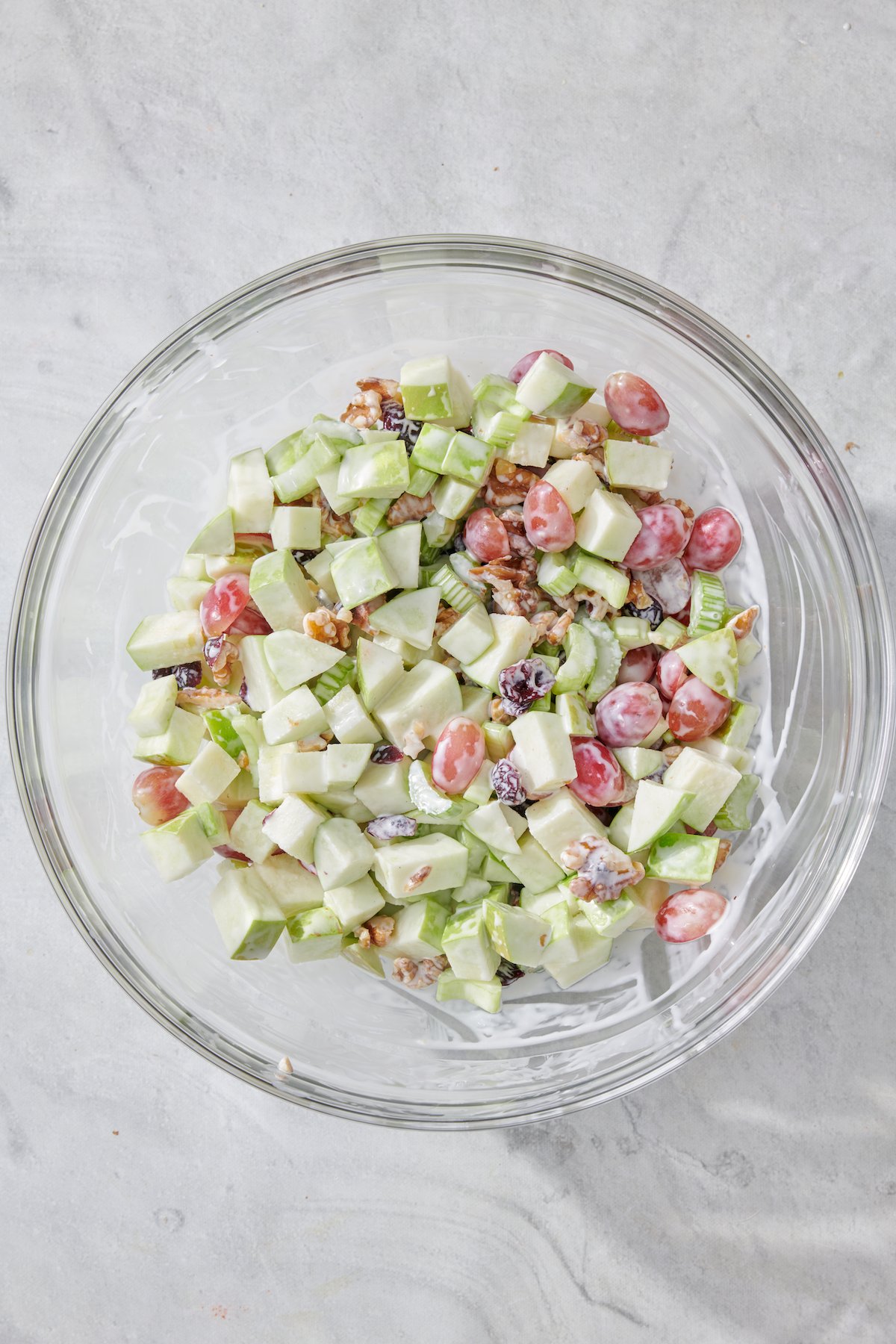 Completed Waldorf Salad in mixing bowl.