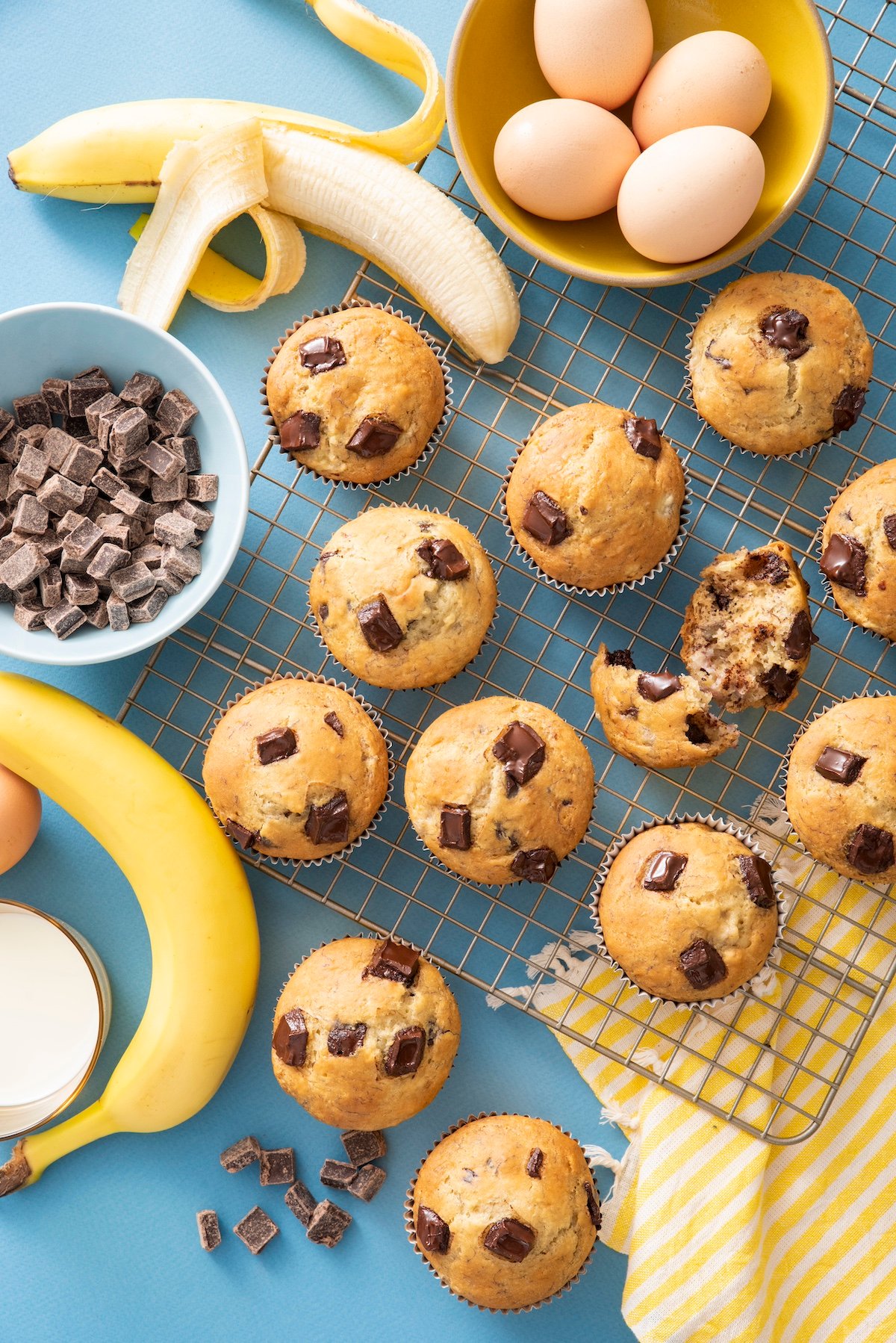 Banana Chocolate Chip muffins cooling on wire rack.