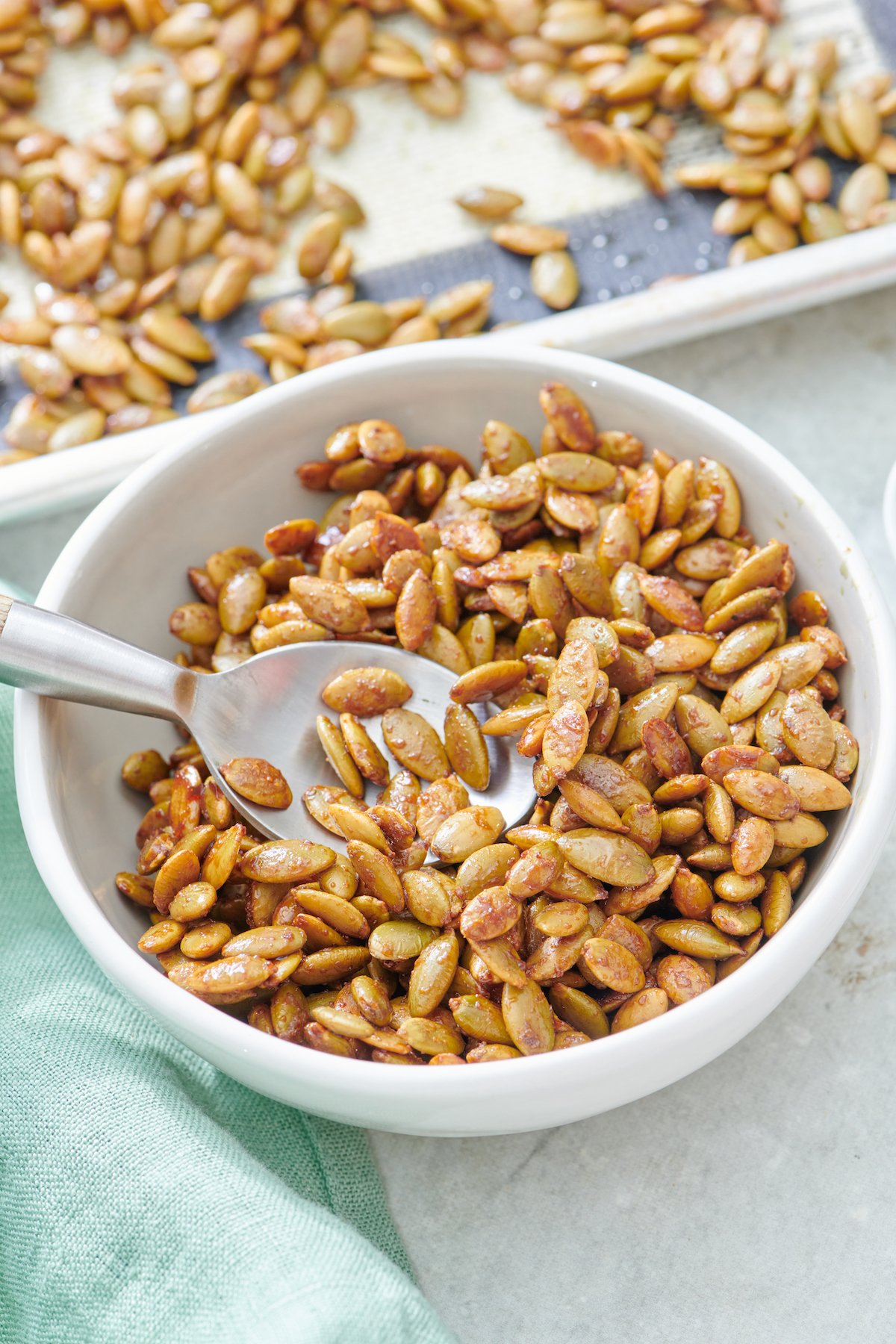 A bowl of Maple Roast Pumpkin Seeds.