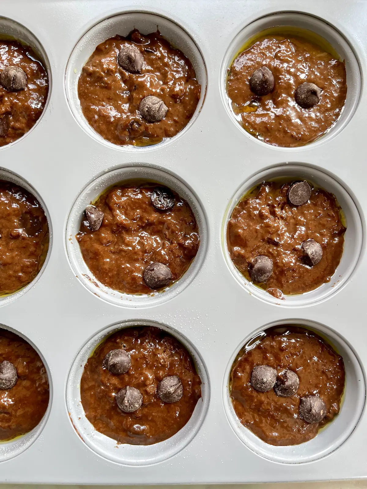chocolate muffins in muffin tin