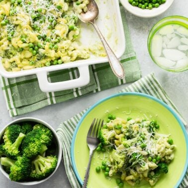 Green macaroni and cheese in a baking dish.