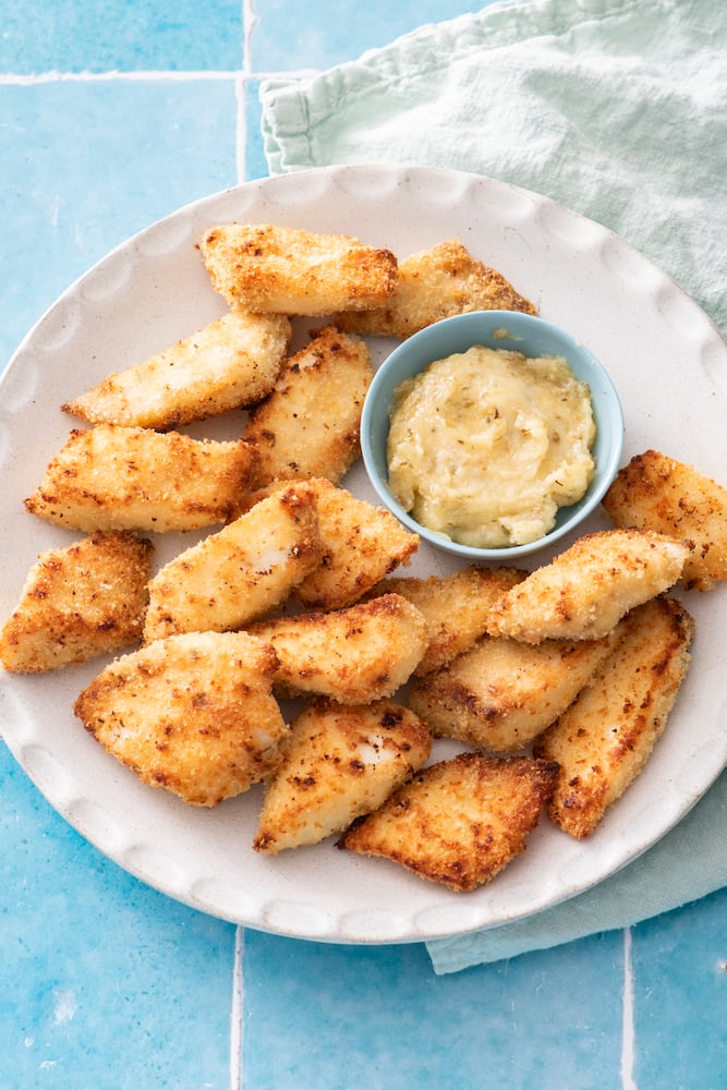 Nugget Sticks Fish Fried Crunchy Line Up Around with Ketchup on