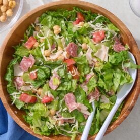 Italian chopped salad in large wooden bowl.