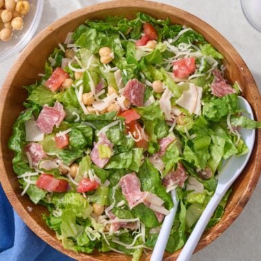 Italian chopped salad in large wooden bowl.