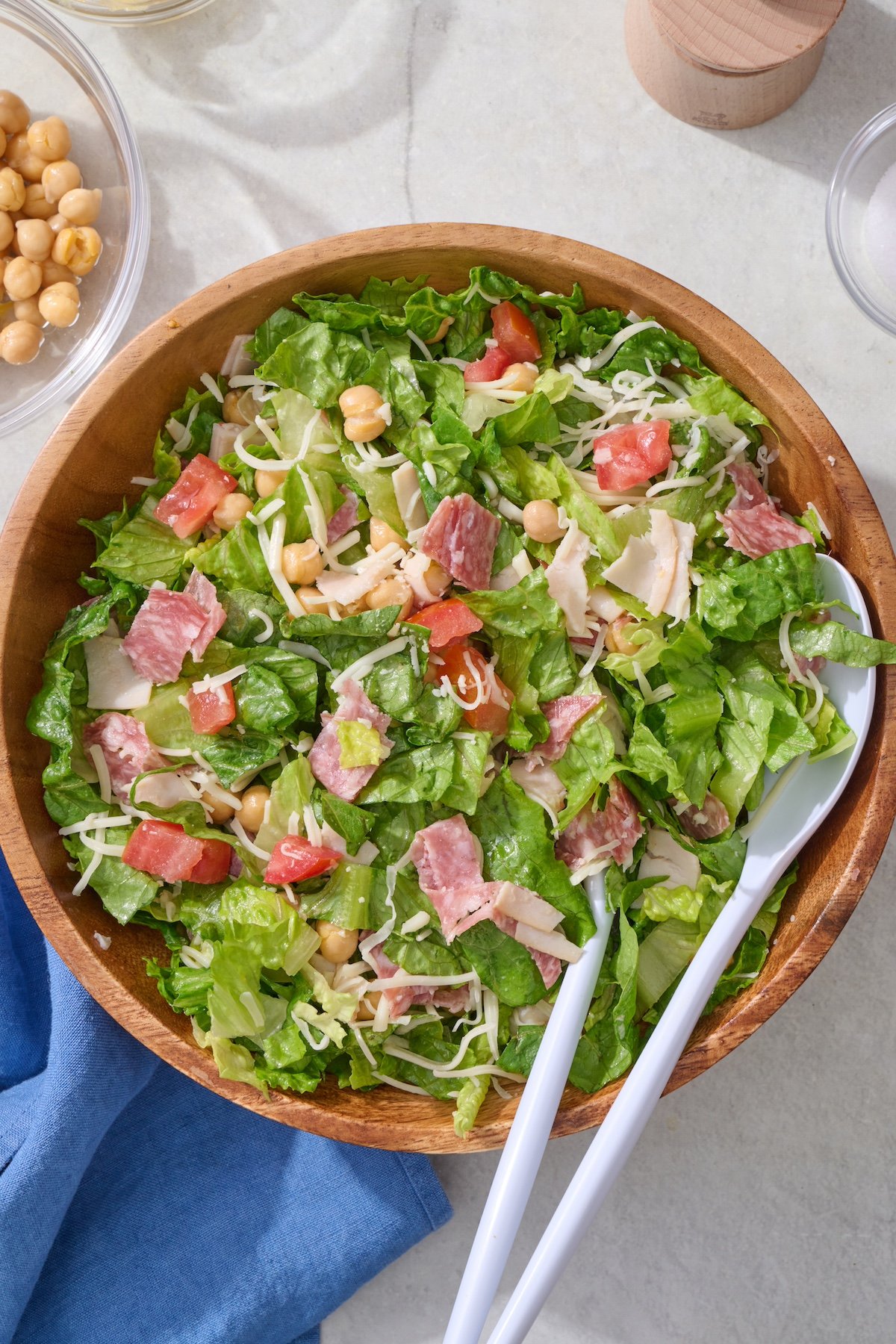 Italian chopped salad in large wooden bowl.