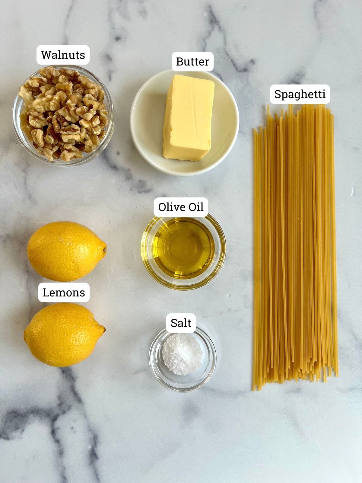 Ingredients needed to lemon spaghetti with toasted walnuts.