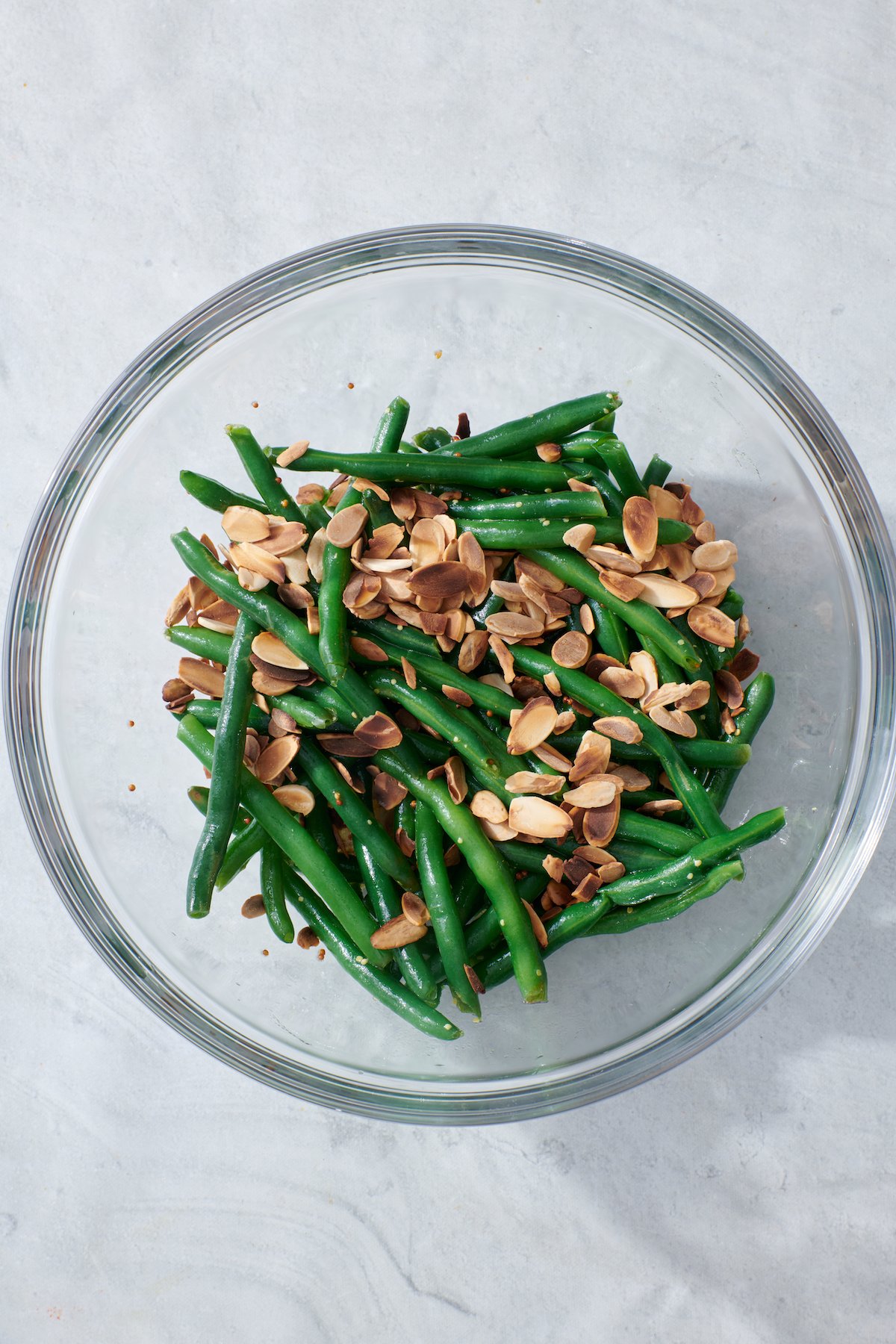 Assembled Green Bean Salad with Mustard Vinaigrette and toasted sliced almonds.