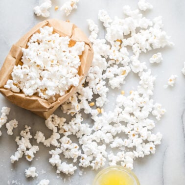 Paper bag popcorn on a counter.