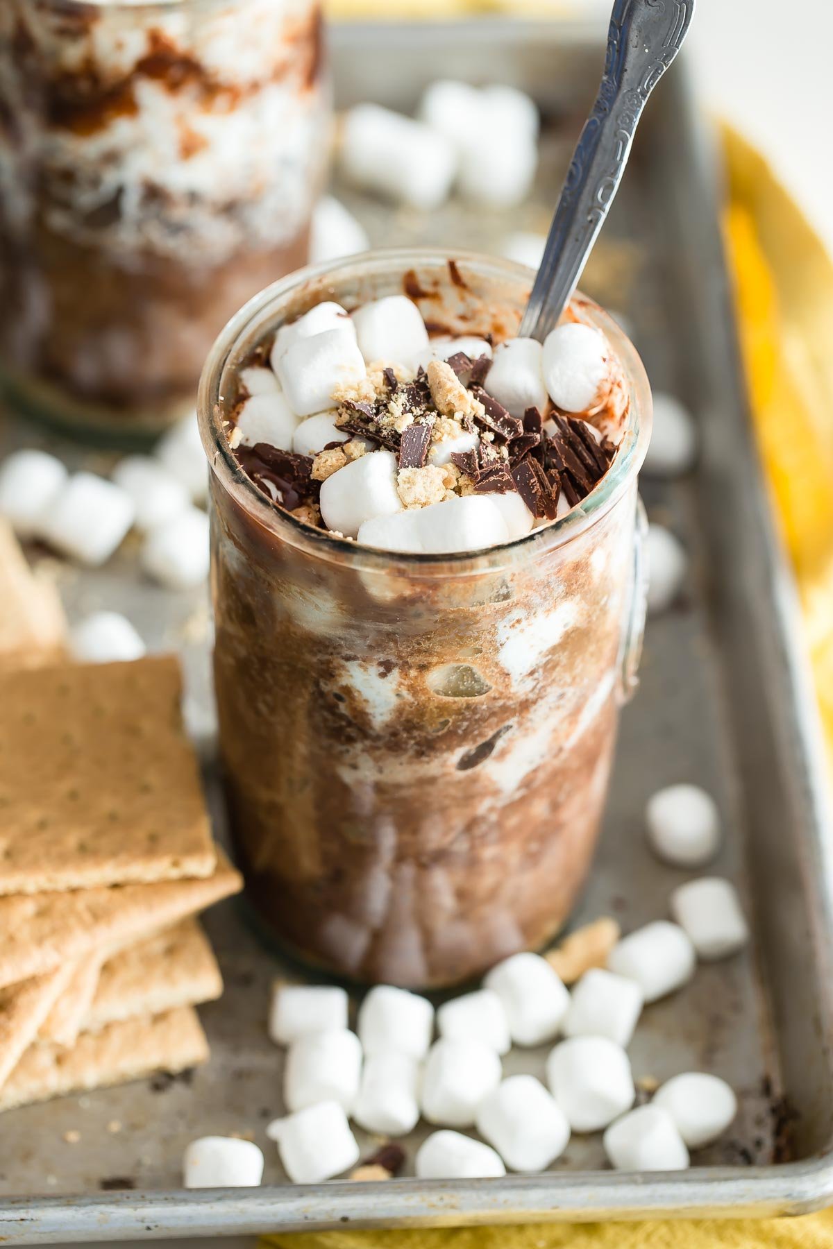 Microwave S'mores Mug Cakes with spoon.