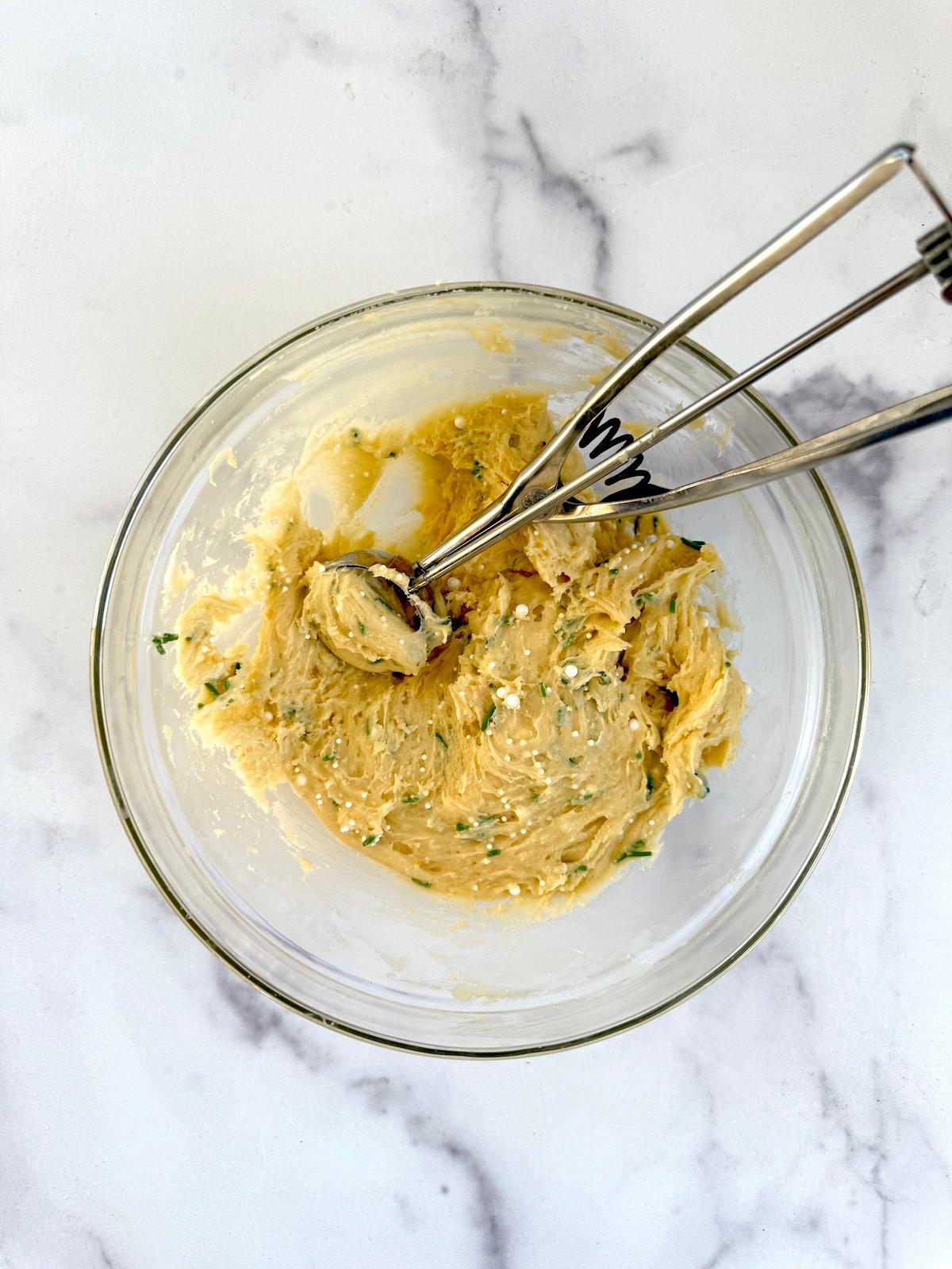 Cake mix sprinkle cookie dough in a bowl.