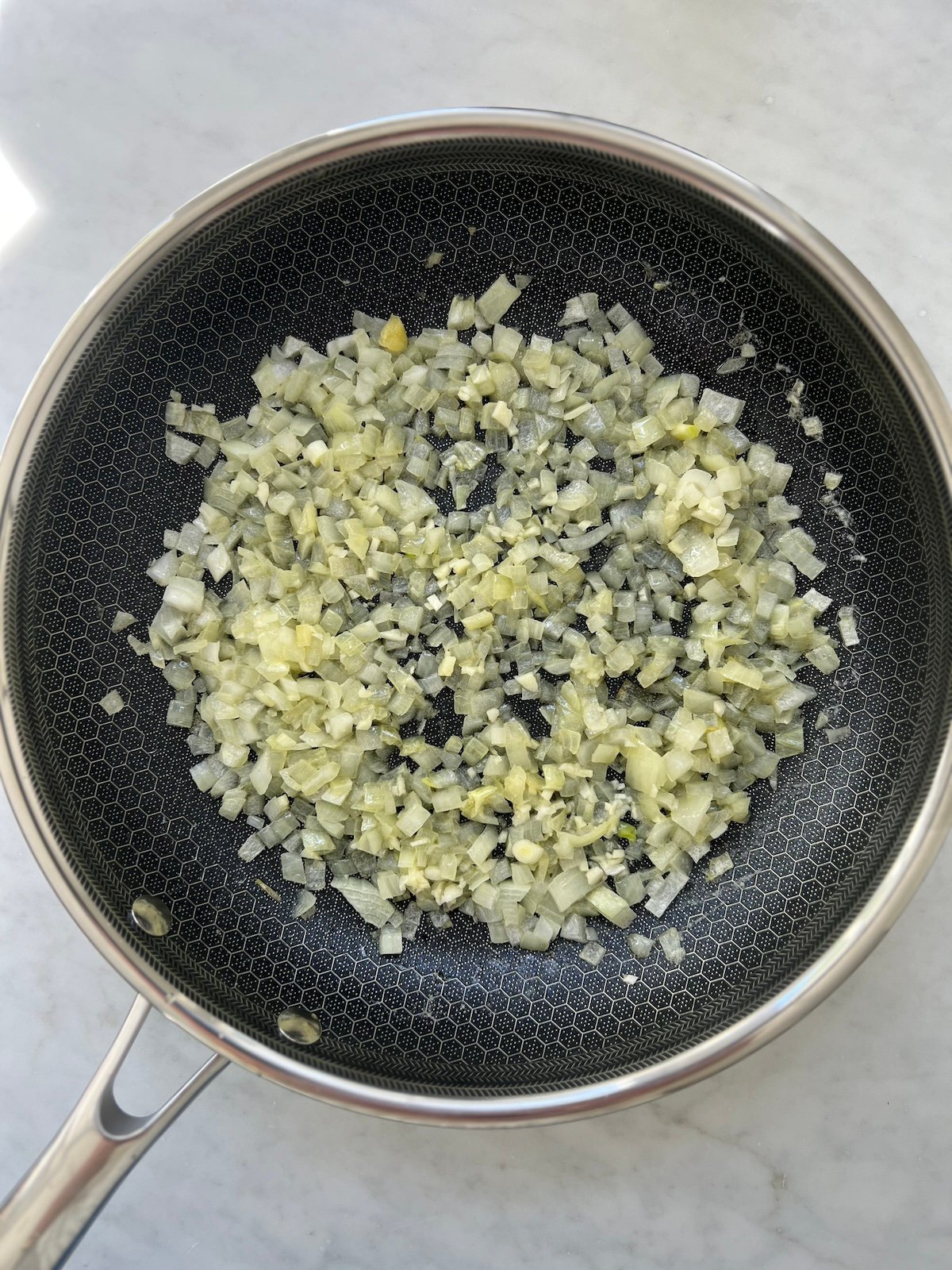 Sautéed onions in a pan