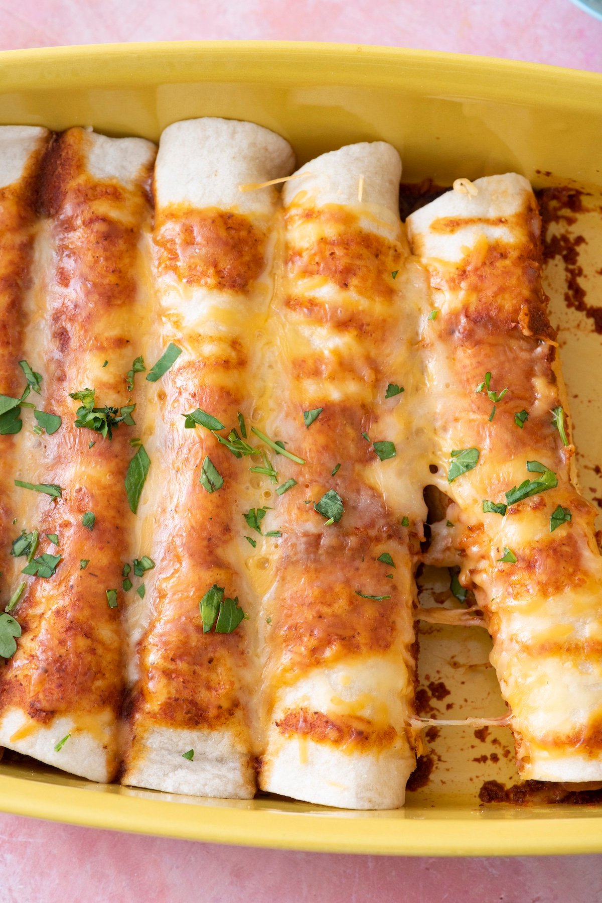 Mexican enchiladas in a baking dish.