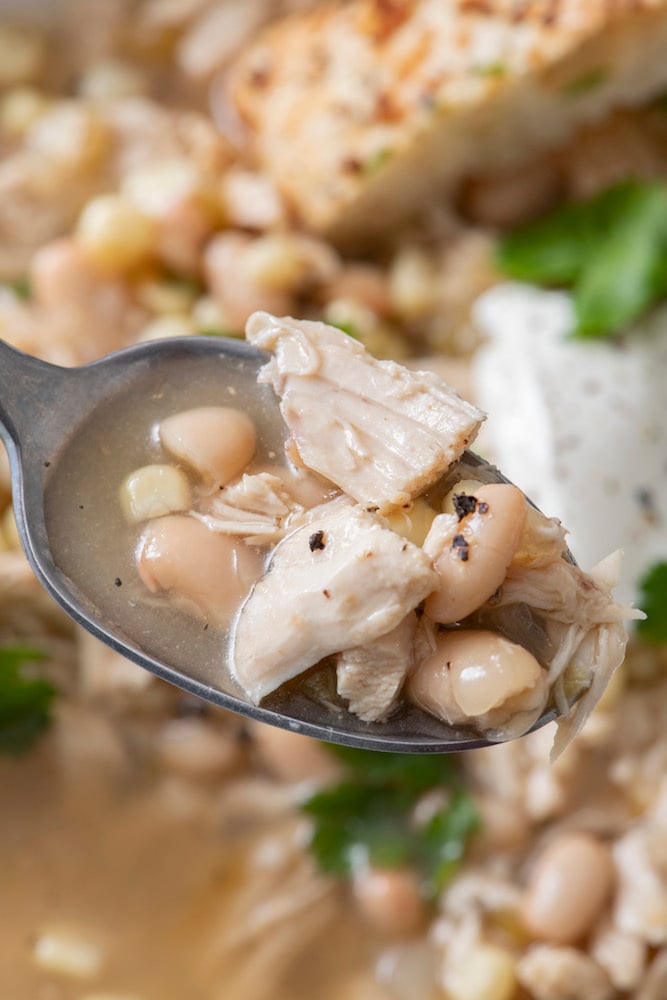 A spoonful of white chicken chili