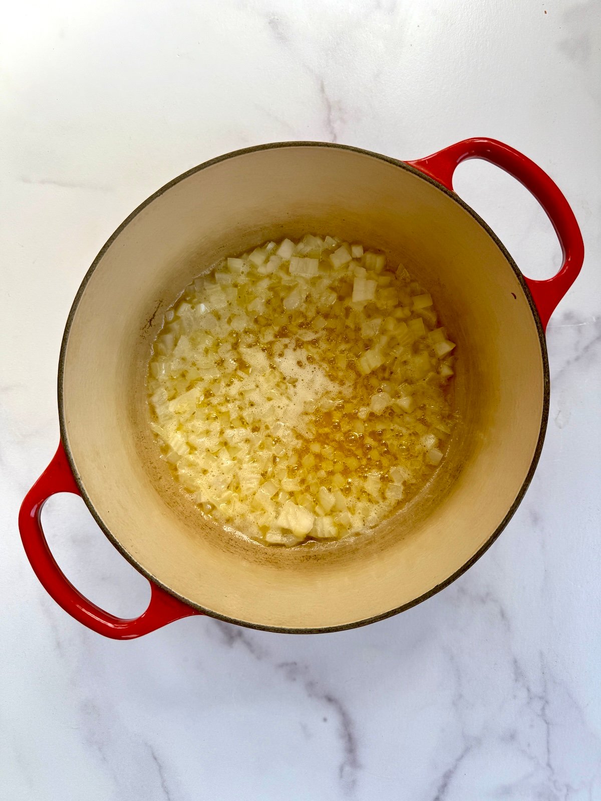 Sauteed onion in a stock pot.