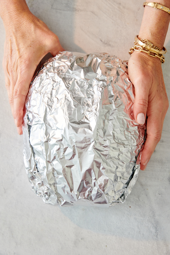 sourdough loaf wrapped in aluminum foil