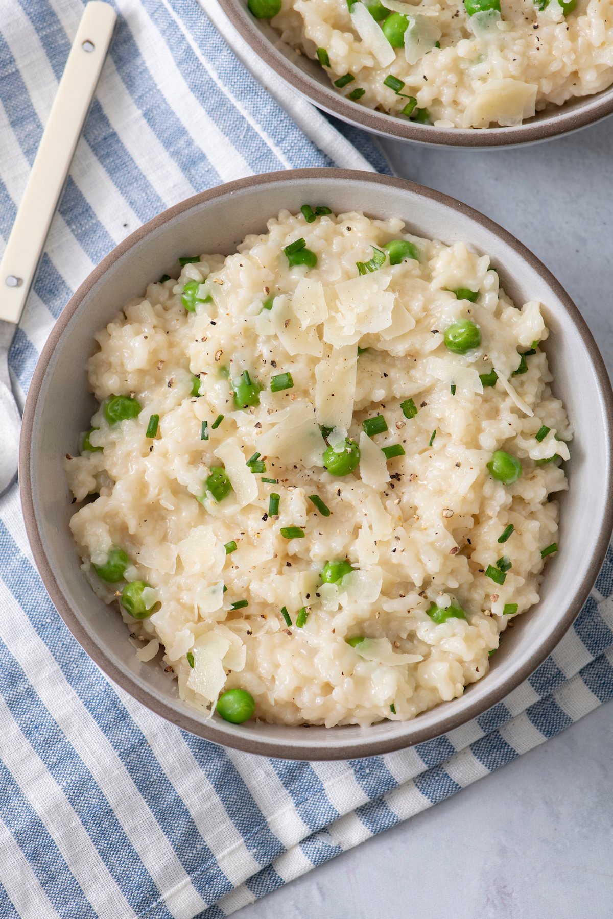 risotto with peas in serving bowl