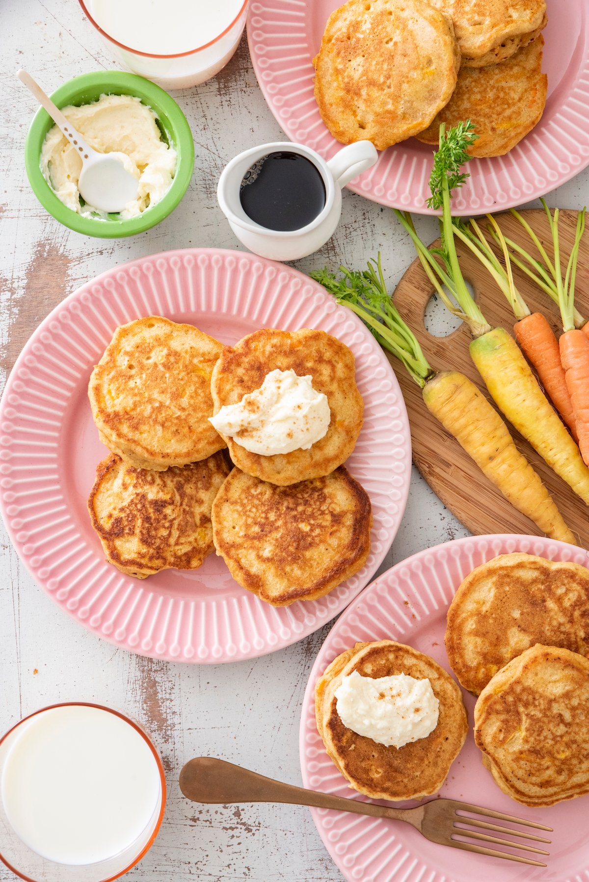 overhead view of carrot cake pancakes on plates