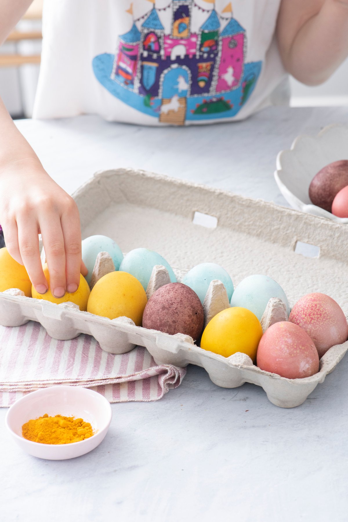 naturally dyed Easter eggs in carton