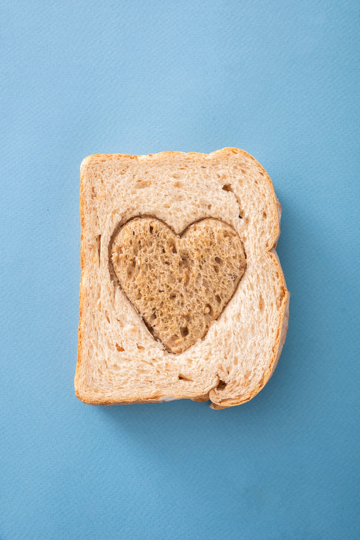 Two-tone sandwich with heart shape.