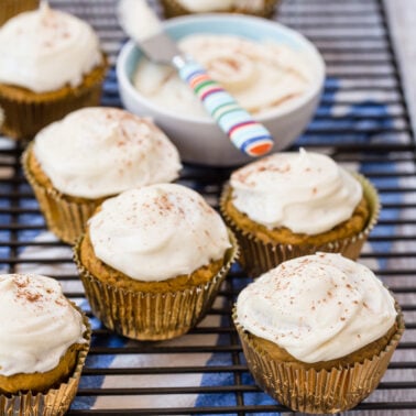 Pumpkin muffins with cream cheese frosting.