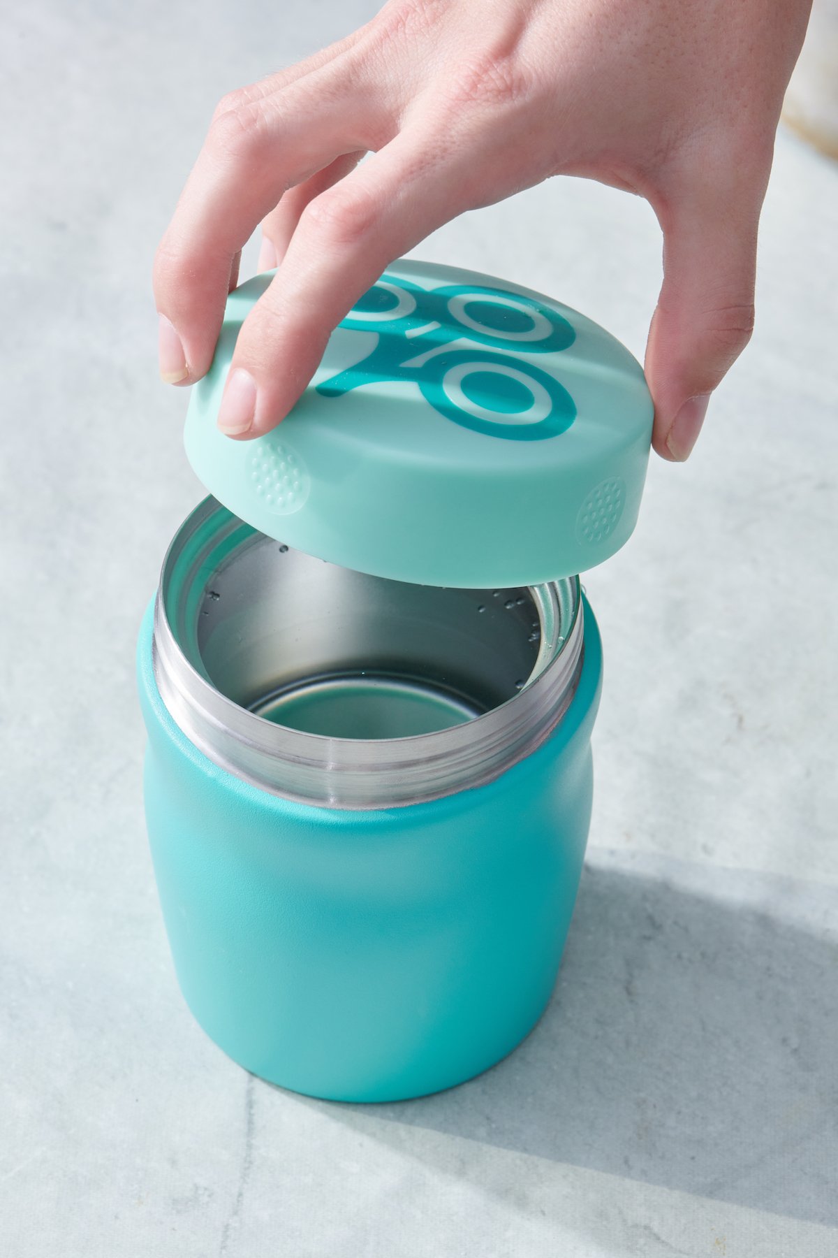 Sealing a thermos with hot water in it.