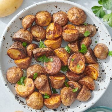 Air fryer baby potatoes on serving platter.