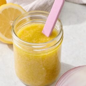 Lemon vinaigrette dressing in mason jar.