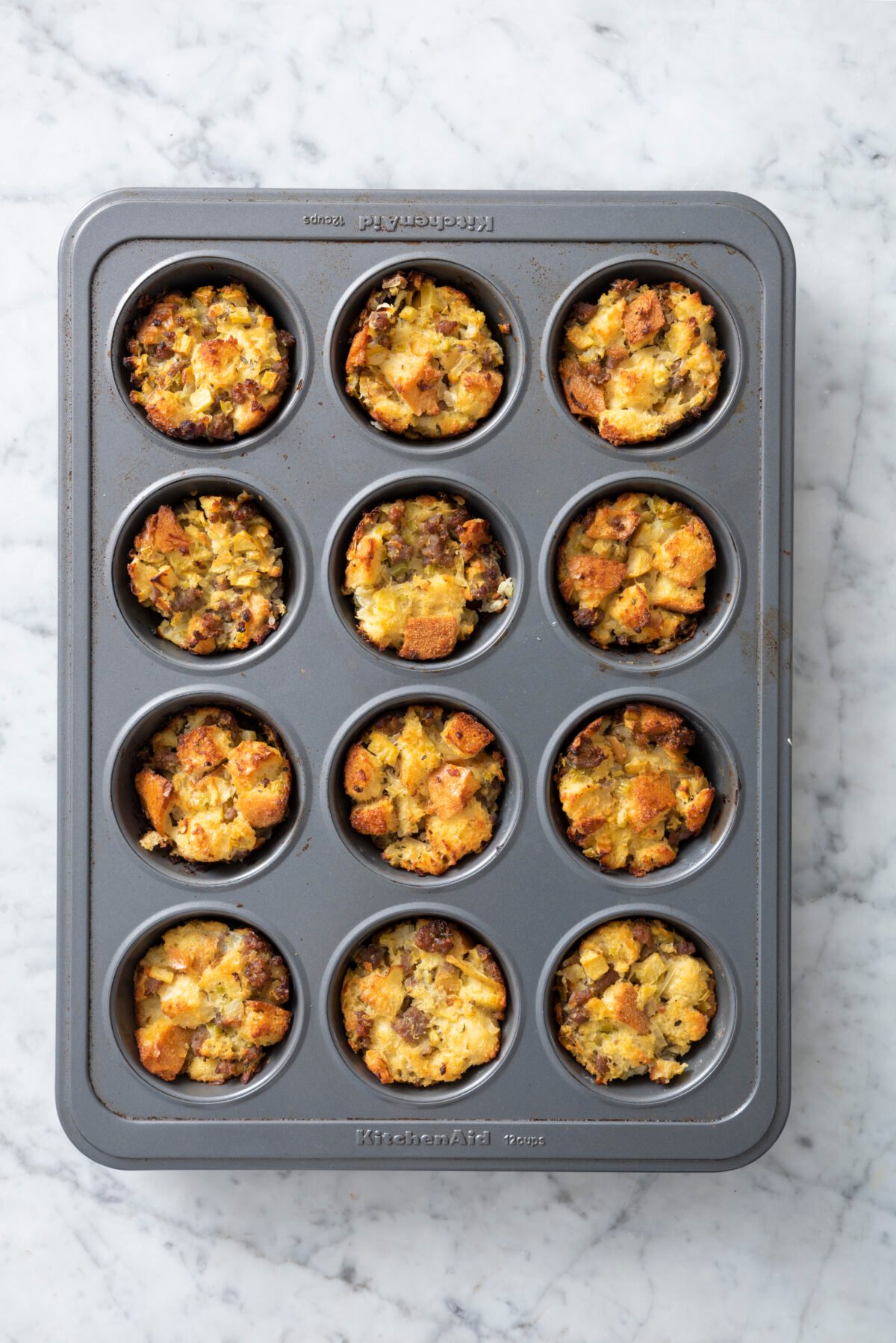 Baked stuffing mix in muffin tin.