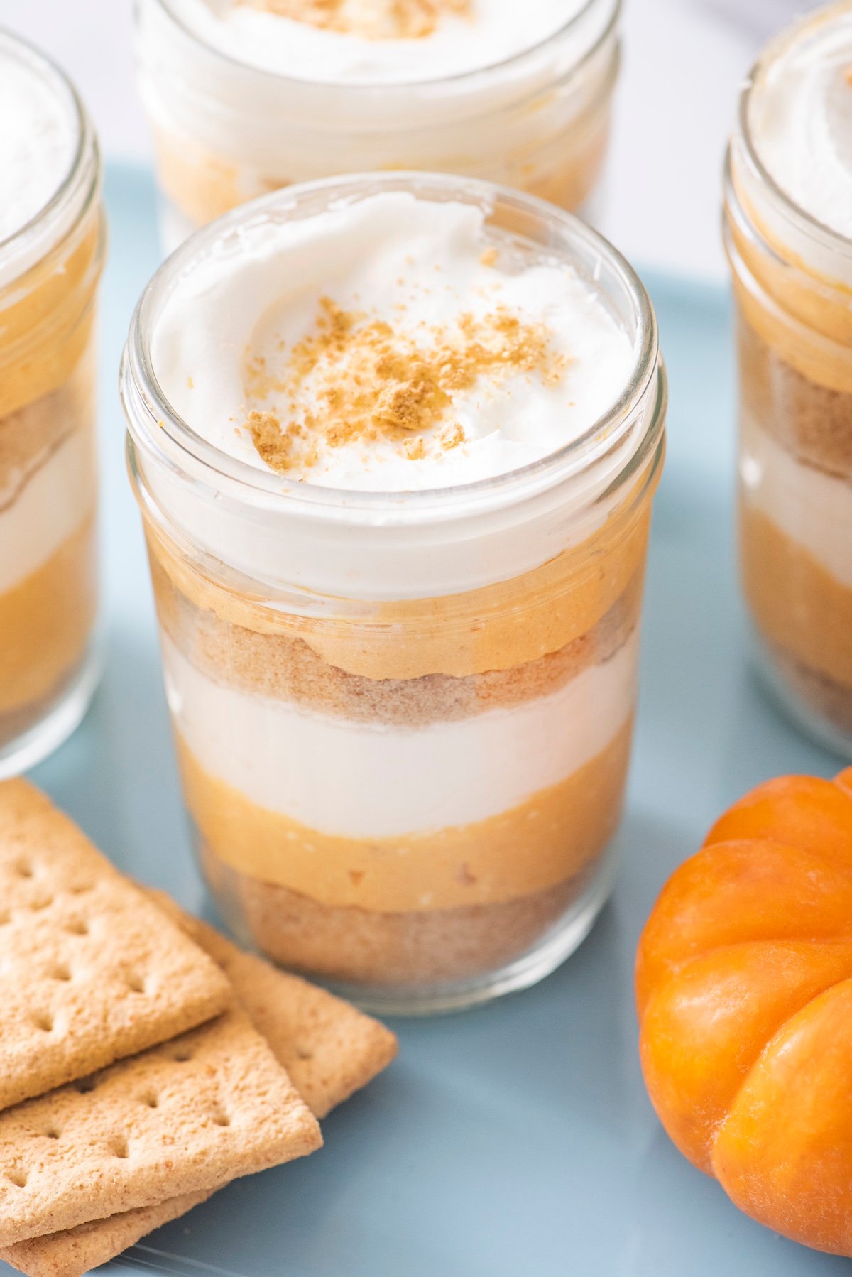 Pumpkin pie parfait in mason jar.