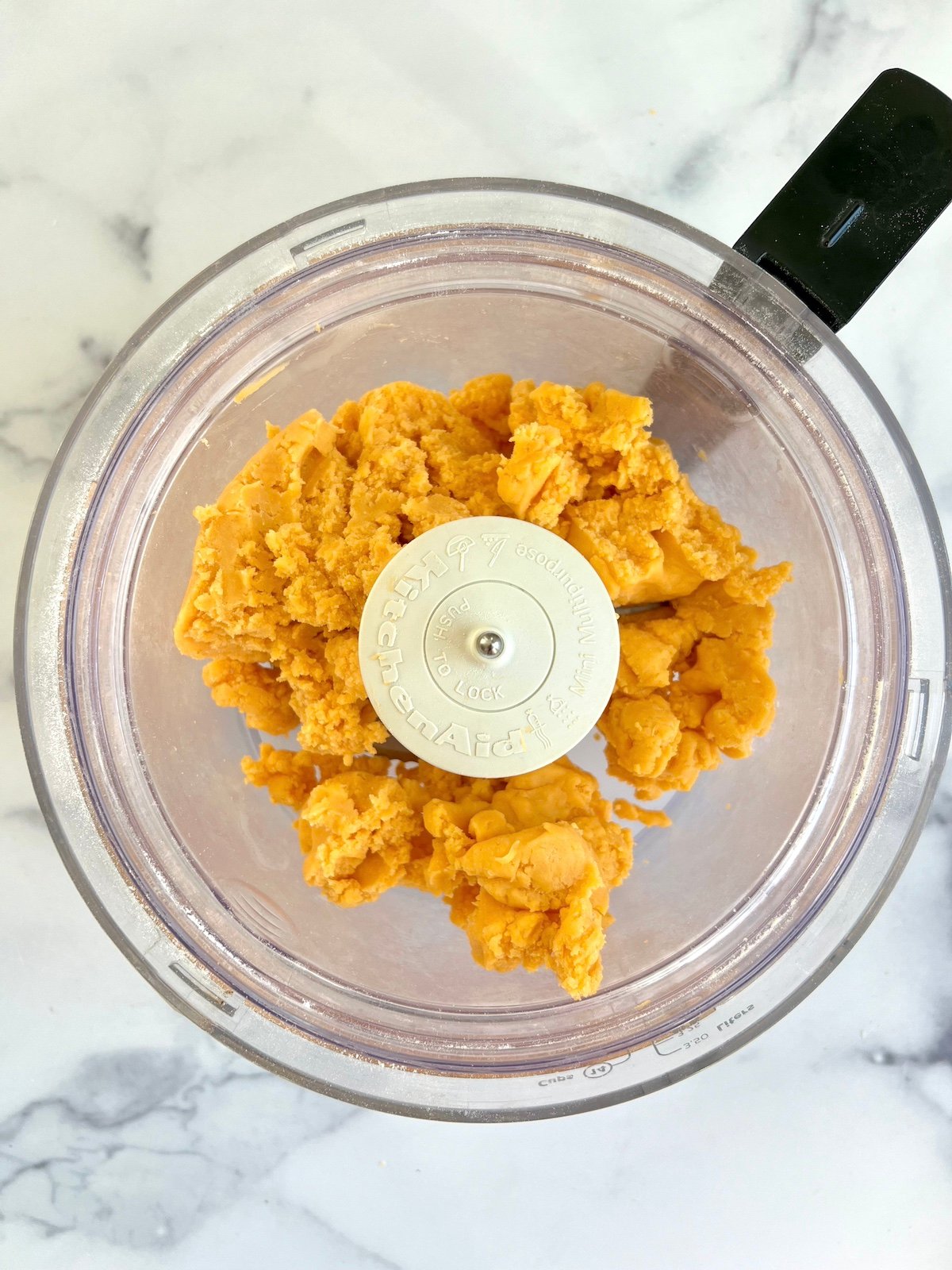 Cheese wafer dough in a food processor.