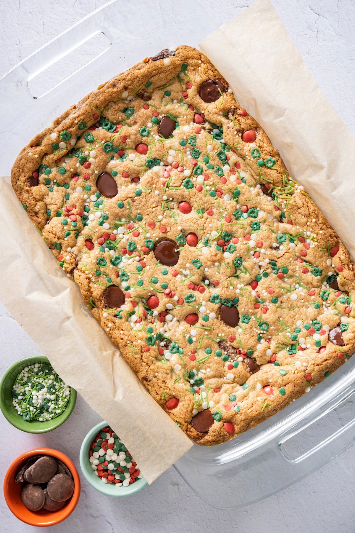 Chocolate chip cookie bars in baking dish.