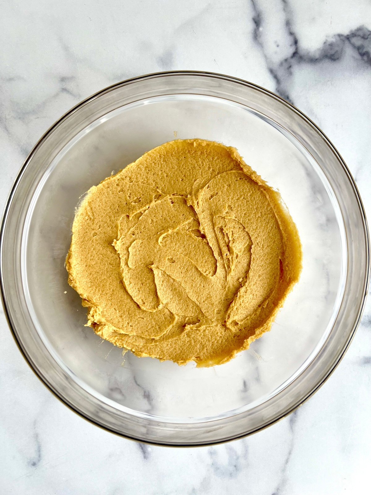 Cookie dough in a mixing bowl.