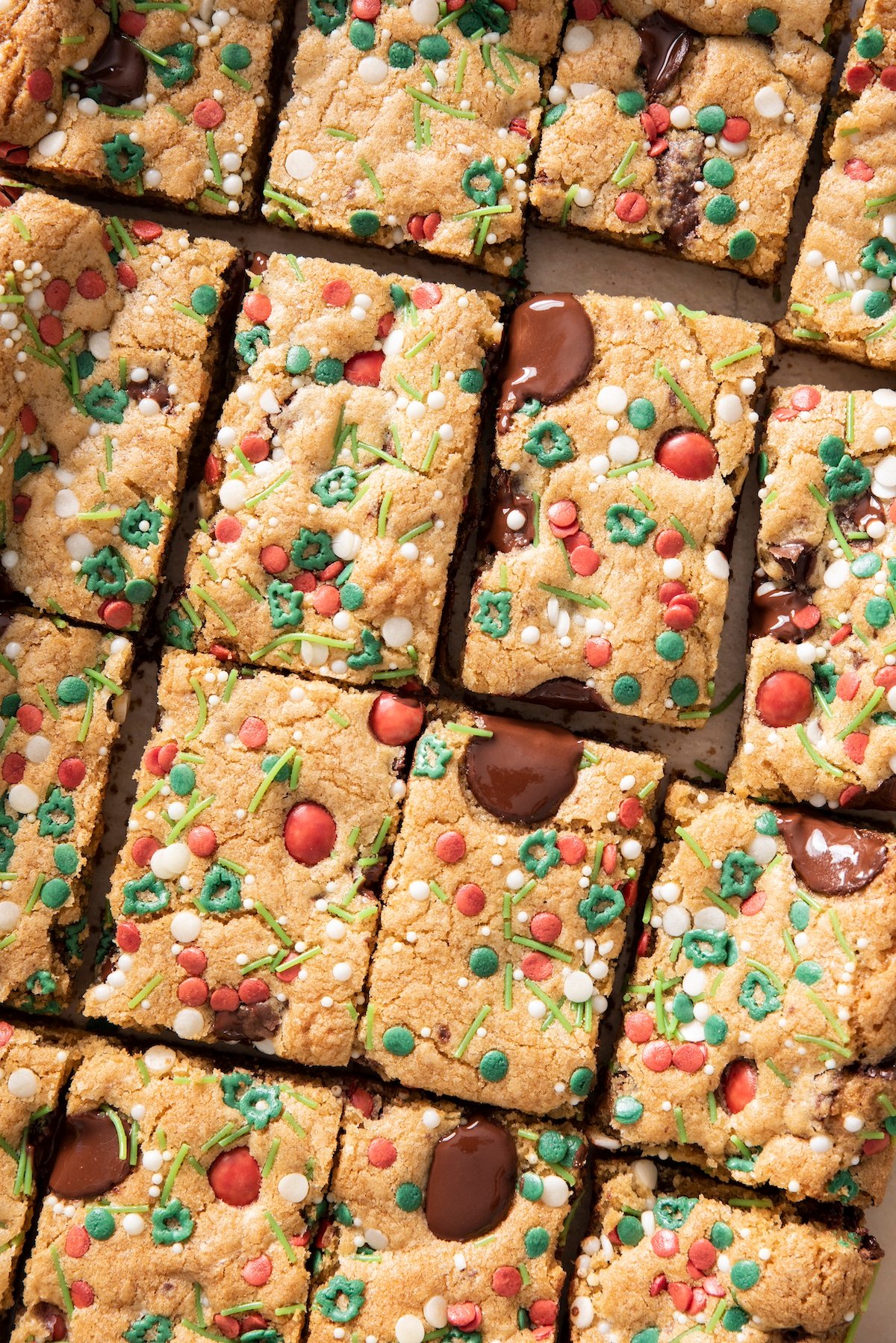 Holiday chocolate chip sprinkle bars cut into squares.