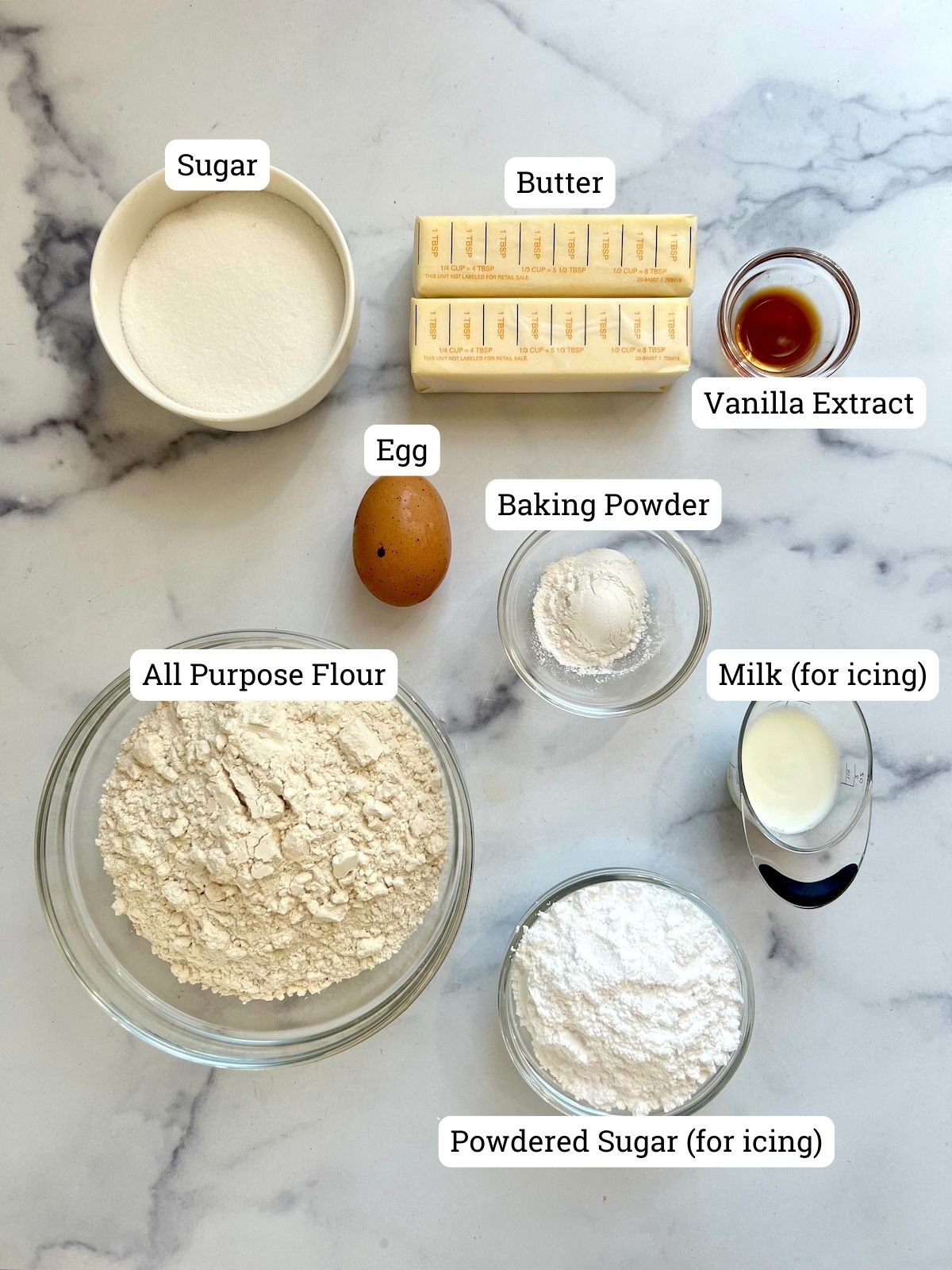 Ingredients for sugar cookies on a counter.