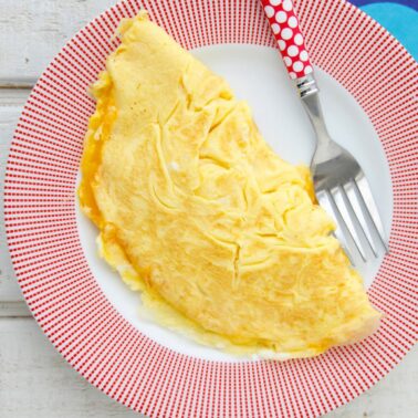 Cheese omelette on a plate.