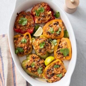 Stuffed peppers in a baking dish.