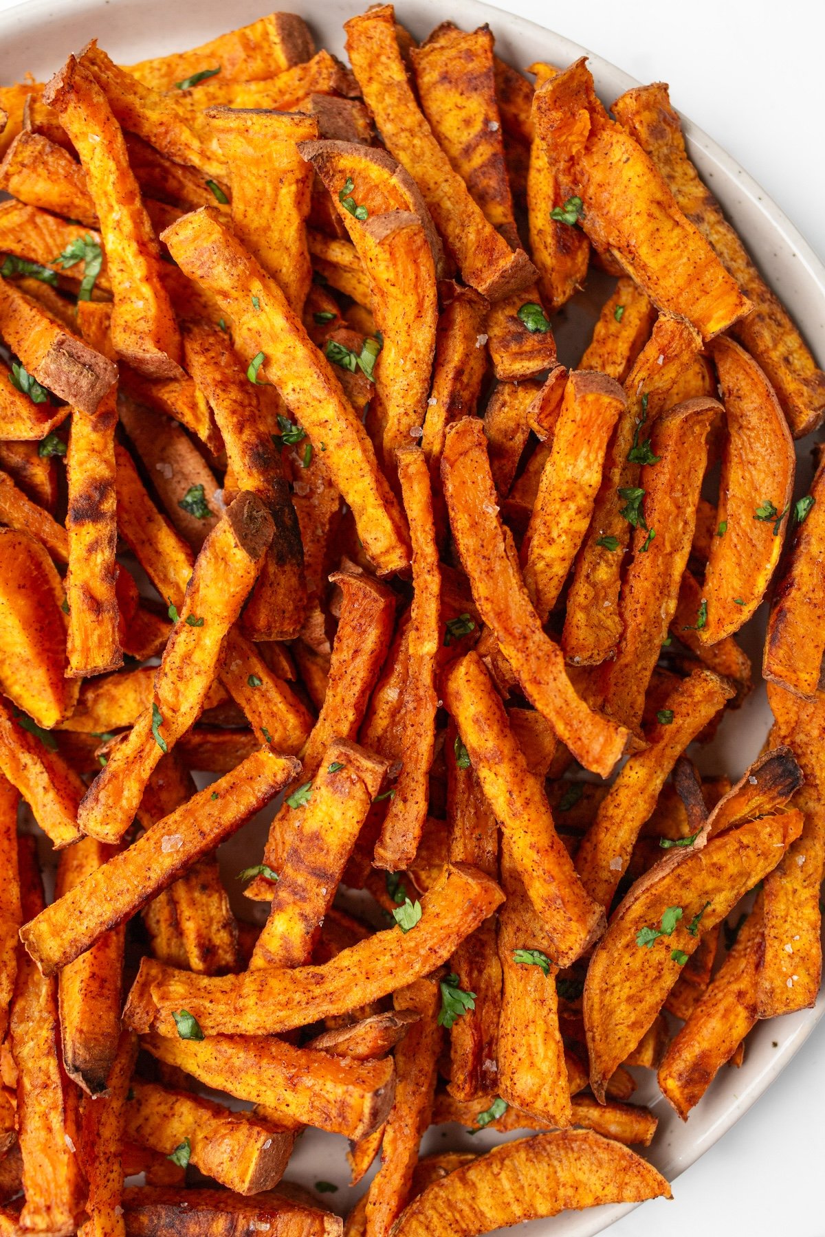 Sweet potato fries on a plate.