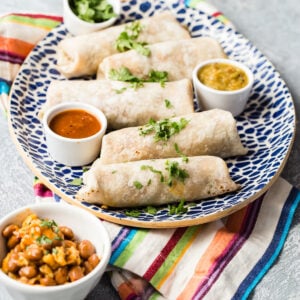 Breakfast burritos on a serving platter.