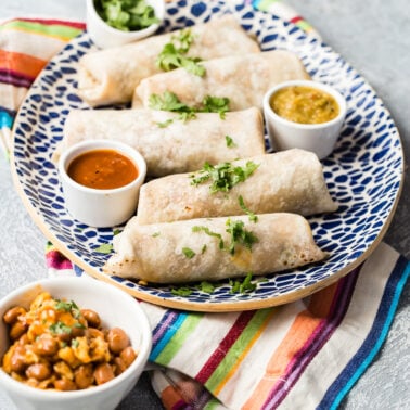 Breakfast burritos on a serving platter.