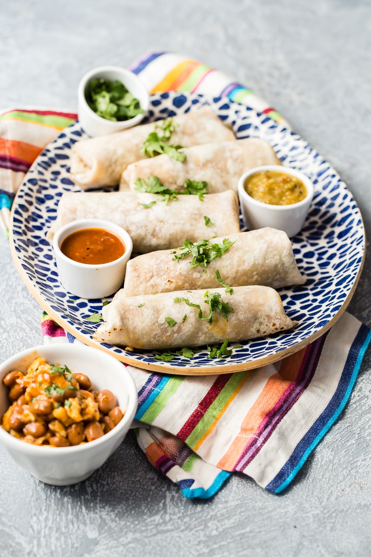 Breakfast burritos on a serving platter.