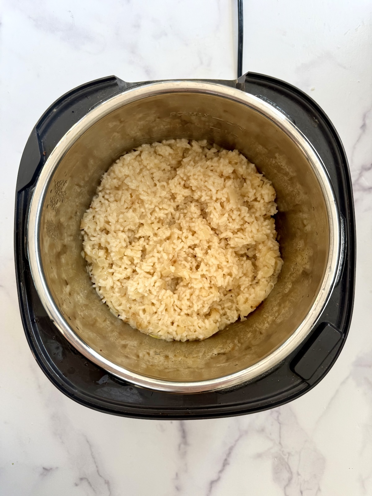 Pressure cooker risotto in electric pressure cooker.